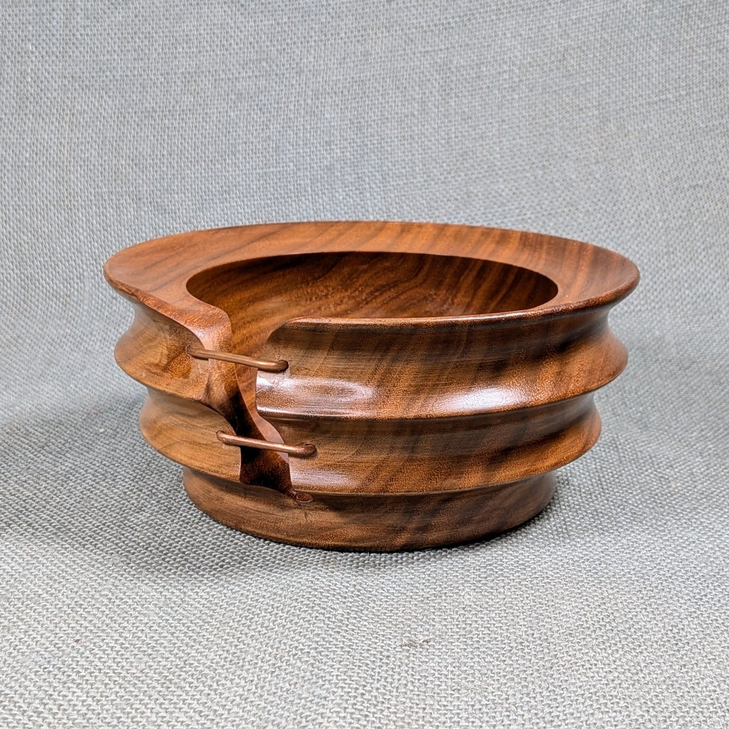 Black Walnut bowl with copper stitches