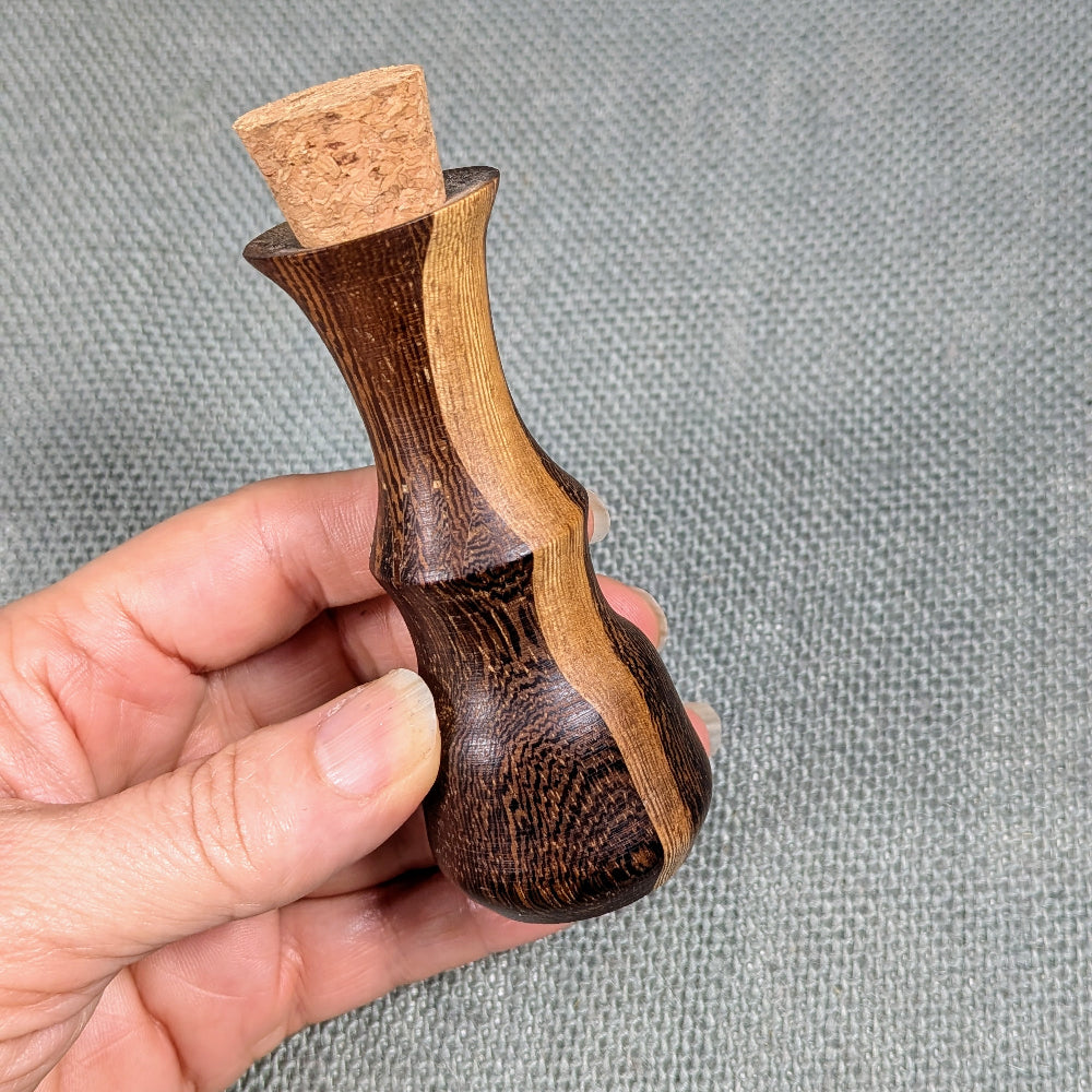 Exotic wood corked bottle