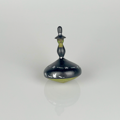 Witch spinning top
