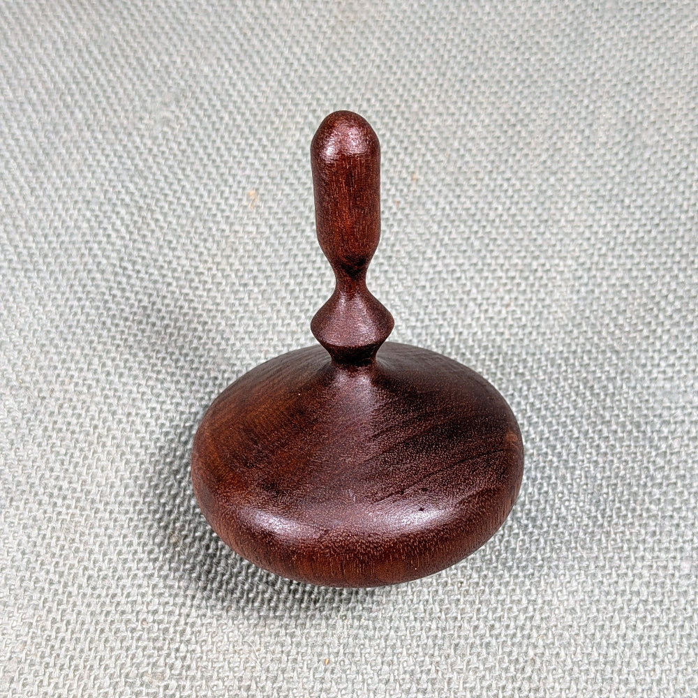 Mahogany spinning top