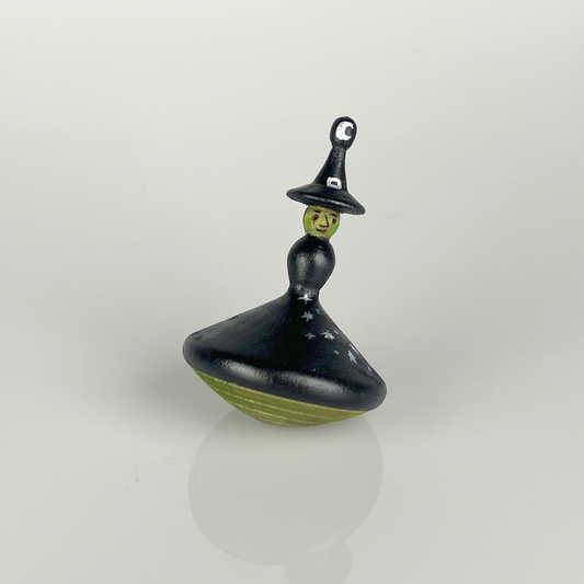 Witch spinning top