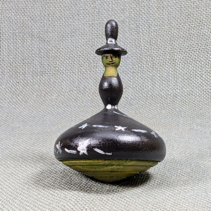 Witch spinning top